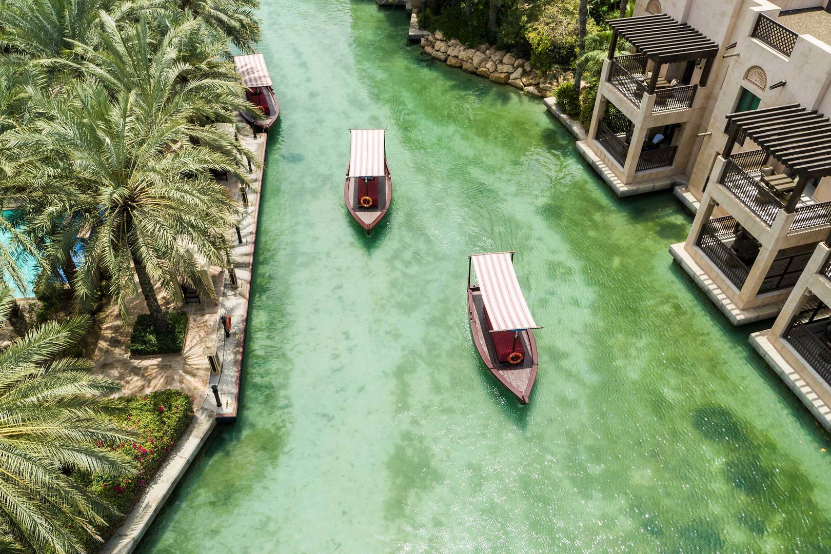 Boats on the Jumeirah Dar AL Masyaf waterways