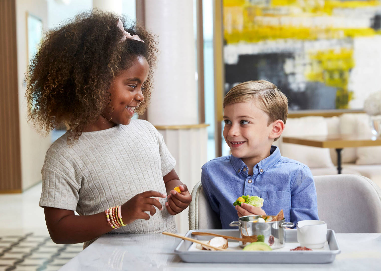 Two kids playing during FoodieKids programme