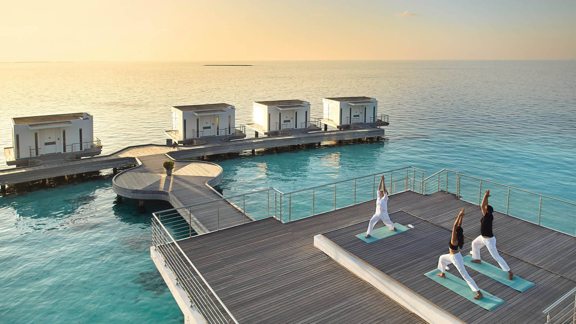 Sunrise yoga session at Jumeirah Maldives Olhahali Island