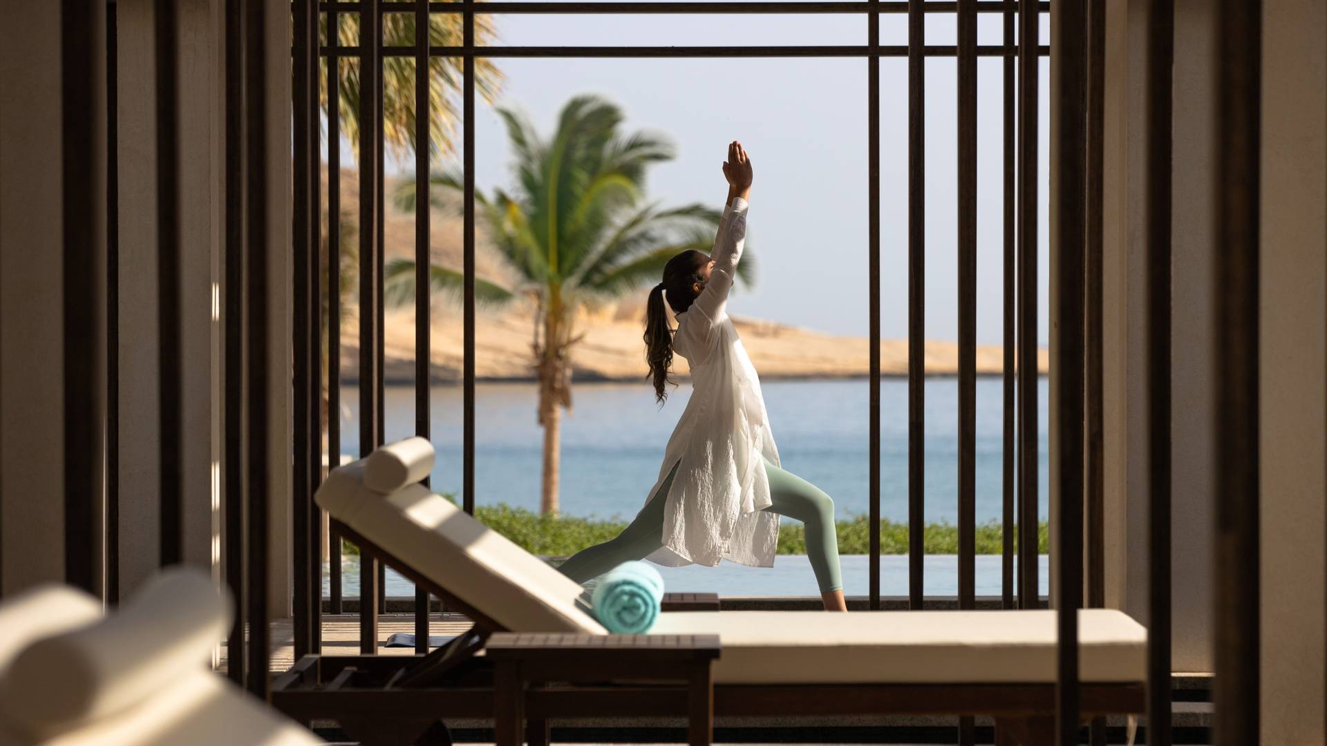 Yoga pose at Jumeirah Muscat Bay