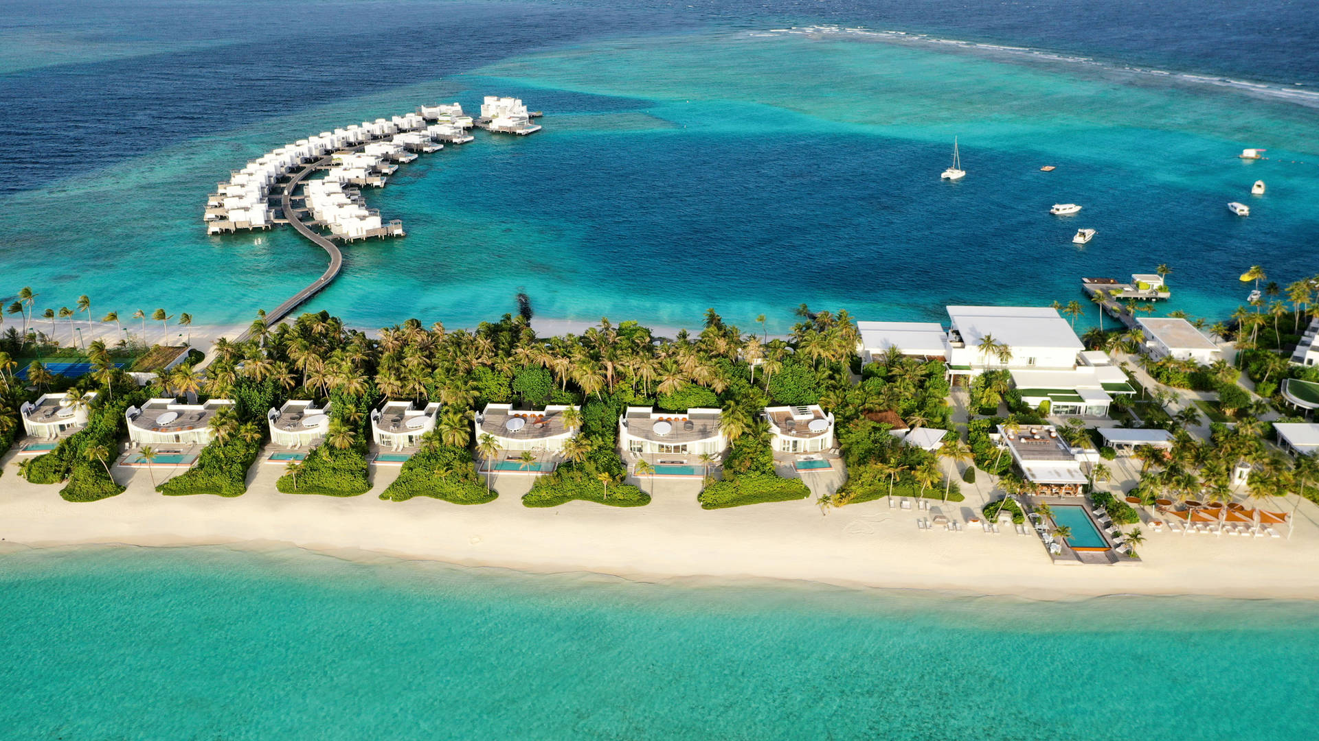 Aeiral view of the private white-sand beach at Jumeirah Maldives